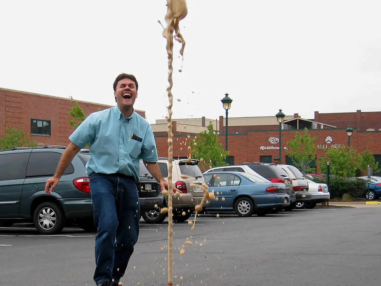In the picture there is a sports player,he is posing for the photograph and on his shirt there are...