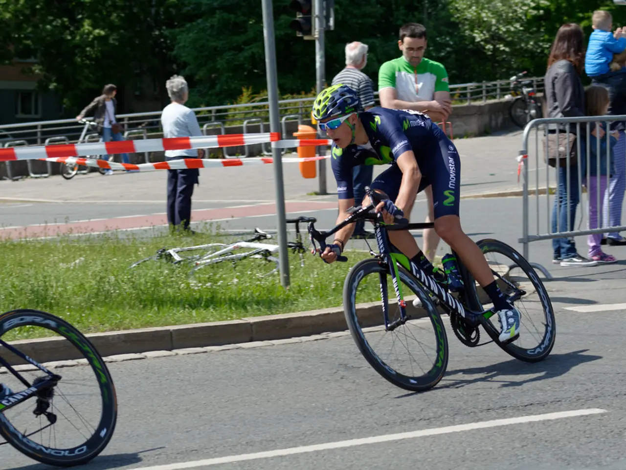 In this picture there is a boy who is cycling on the right side of the image and there is another...