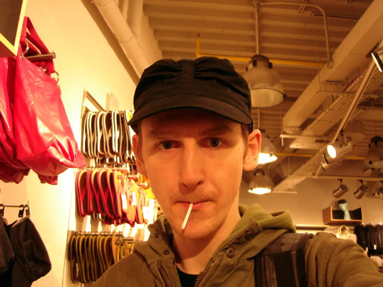 In this picture there is a boy in the center of the image and there are lamps on the roof and there...