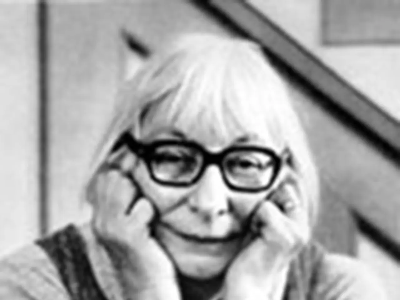 This is a black and white image, in this image there is a woman, in front of a women there are...