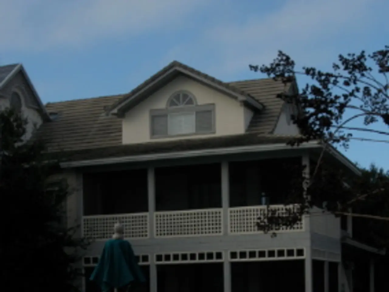 This is the swimming pool on the left side of an image, in the middle it is a building, at the top...