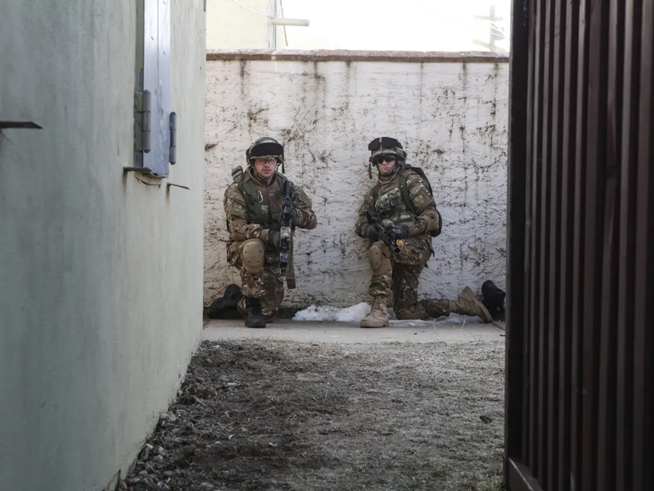 On the left there is a wall and window. On the right there is an iron wall. In the center of the...