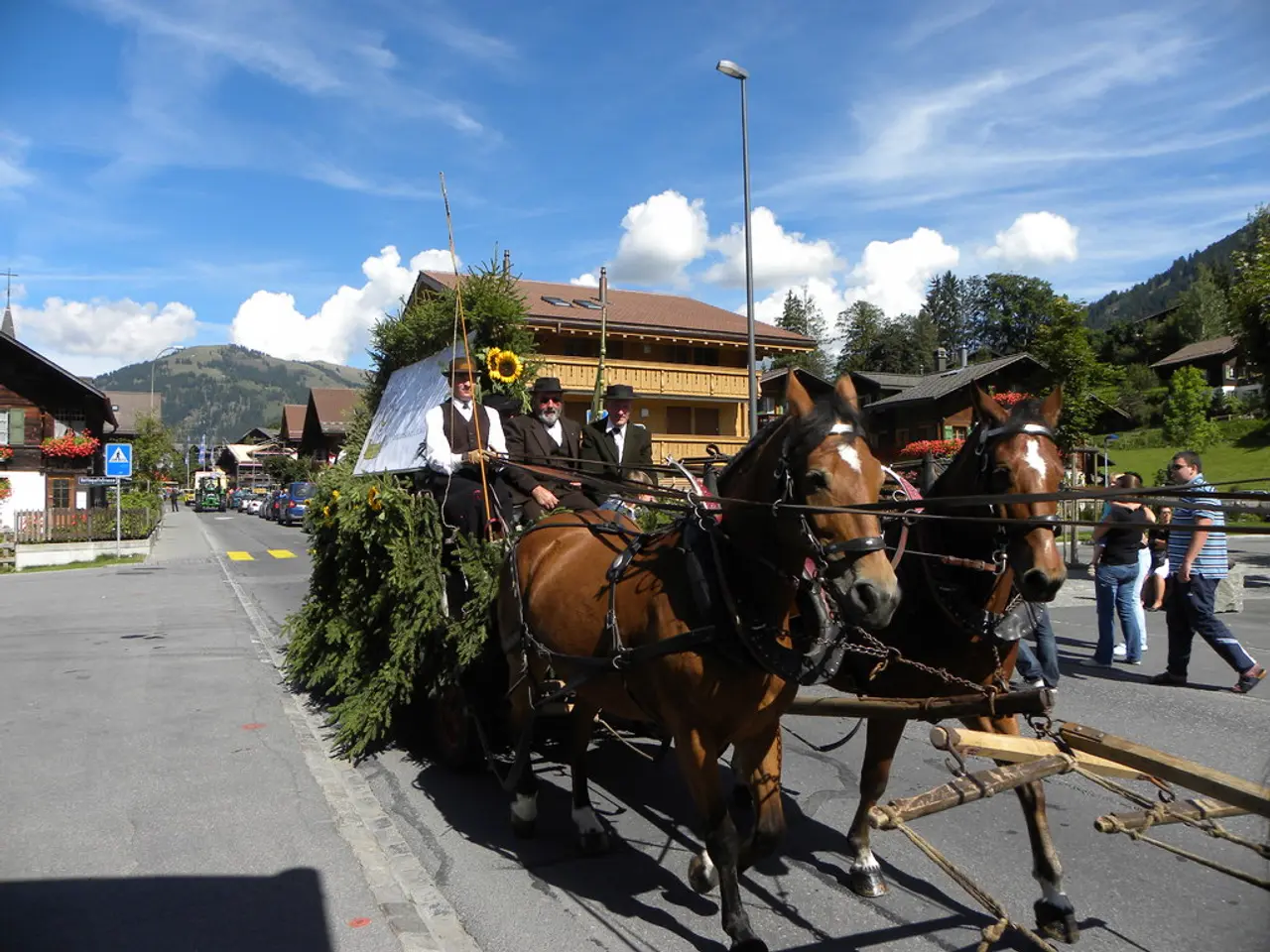 In this picture we can see there are three people sitting on a cart and on the cart there is a...