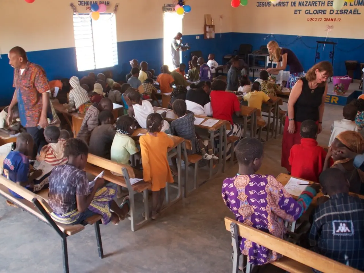 There are children those who are sitting on the benches in the foreground area of the image and...