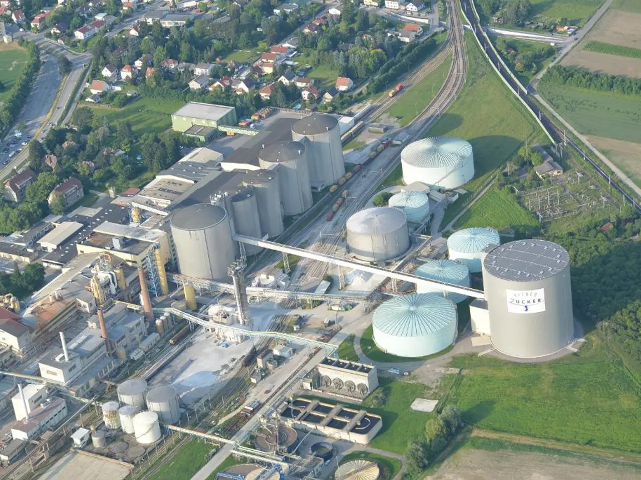 Here we can see the number of buildings, grass, houses, trees and vehicles are on the road.