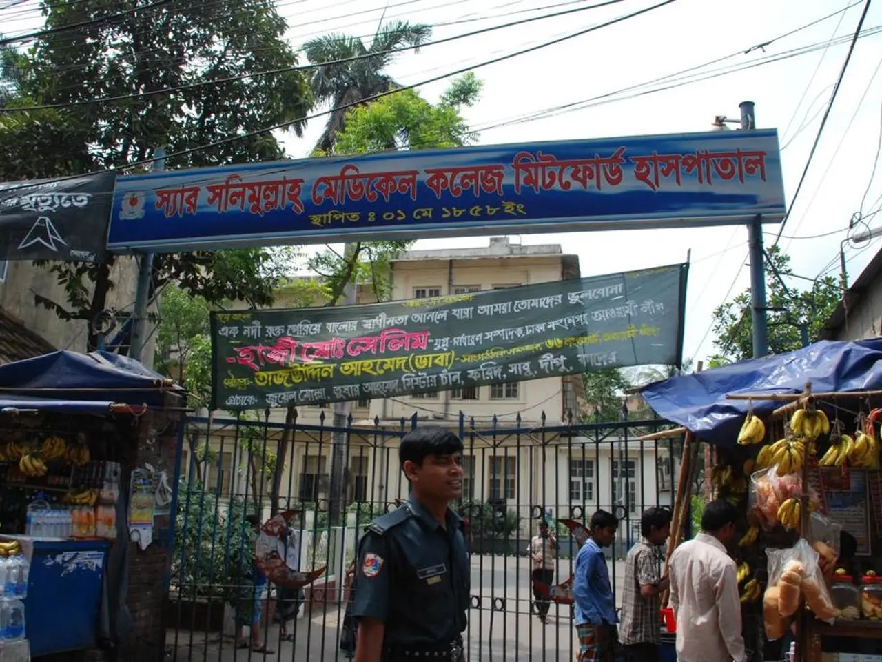 In this image, there is an outside view. There are group of people standing and wearing clothes....