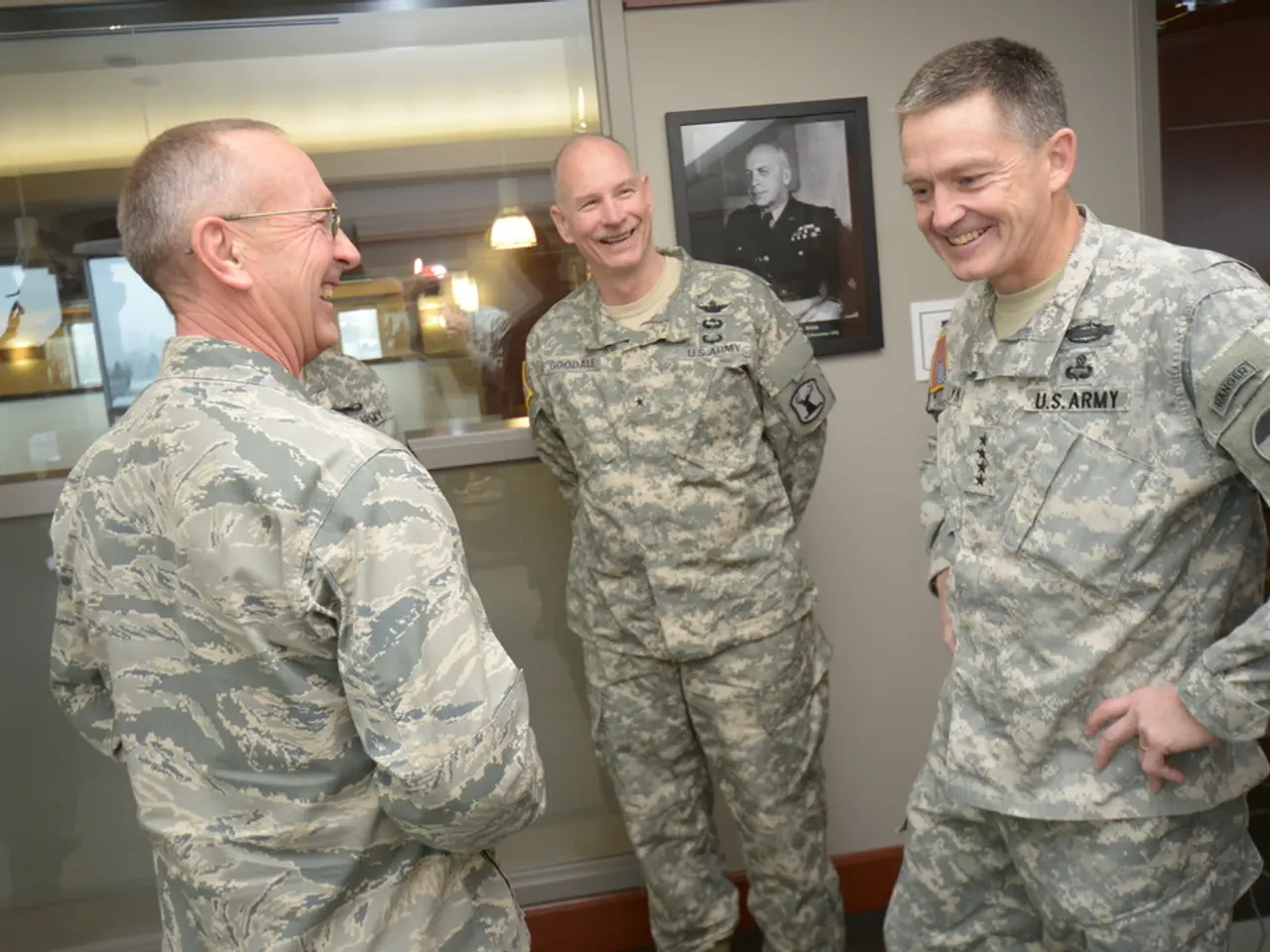 In front of the picture, we see three men in the uniform are standing. Three of them are smiling....