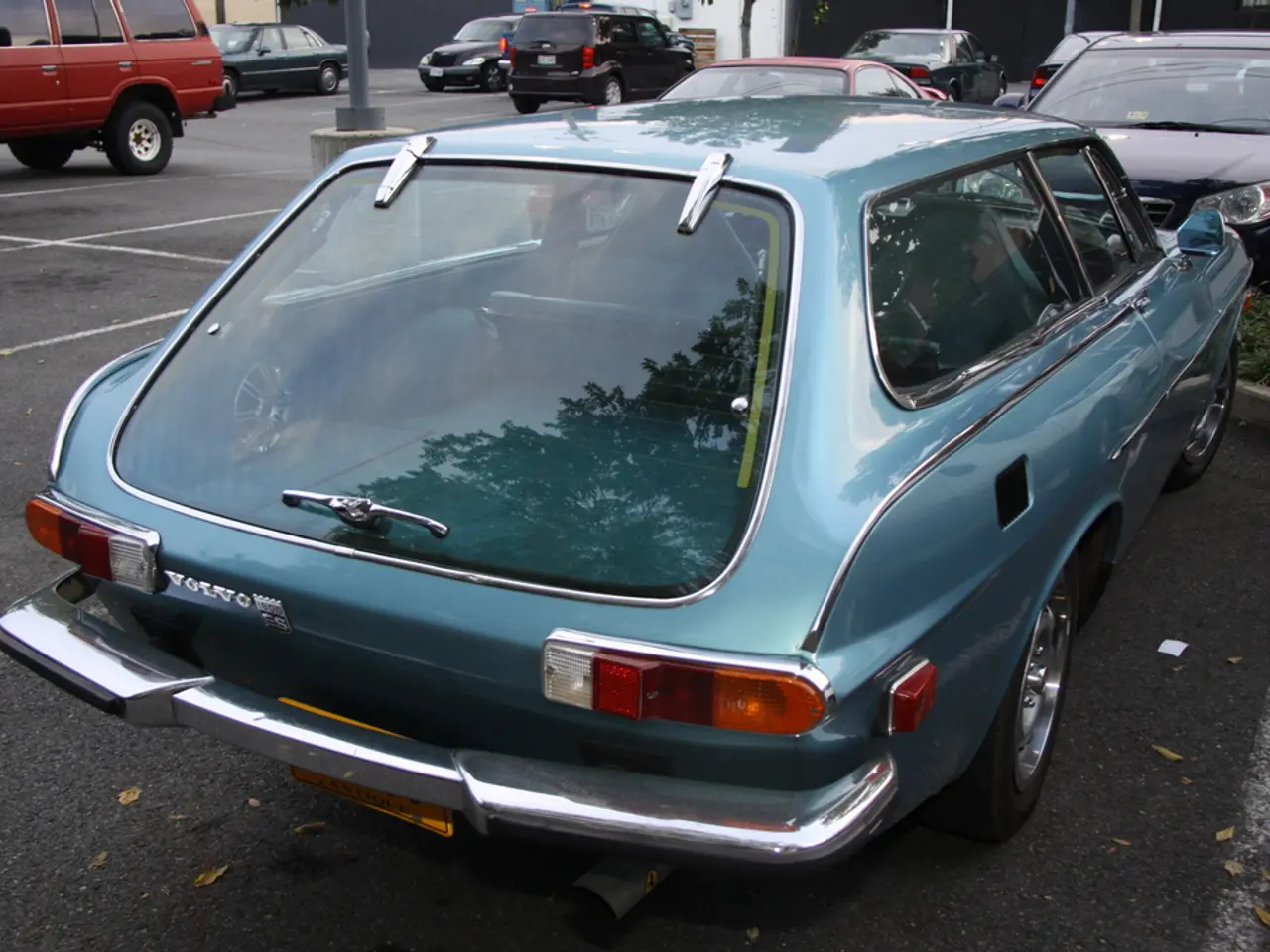 In this image there is a parking are in that area cars are parked.