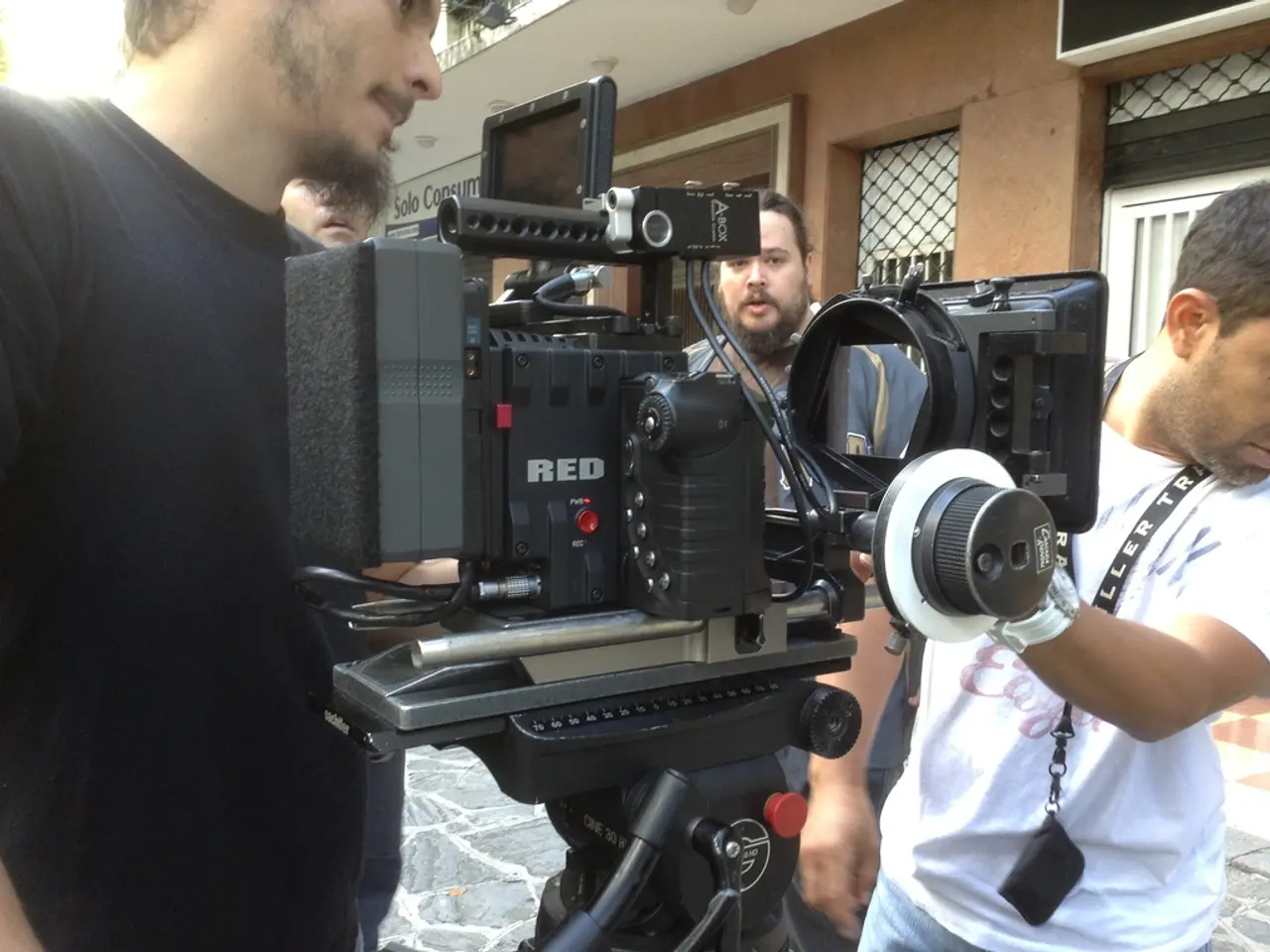 This might be a picture taken during a shooting. In the foreground of the picture there is a camera...