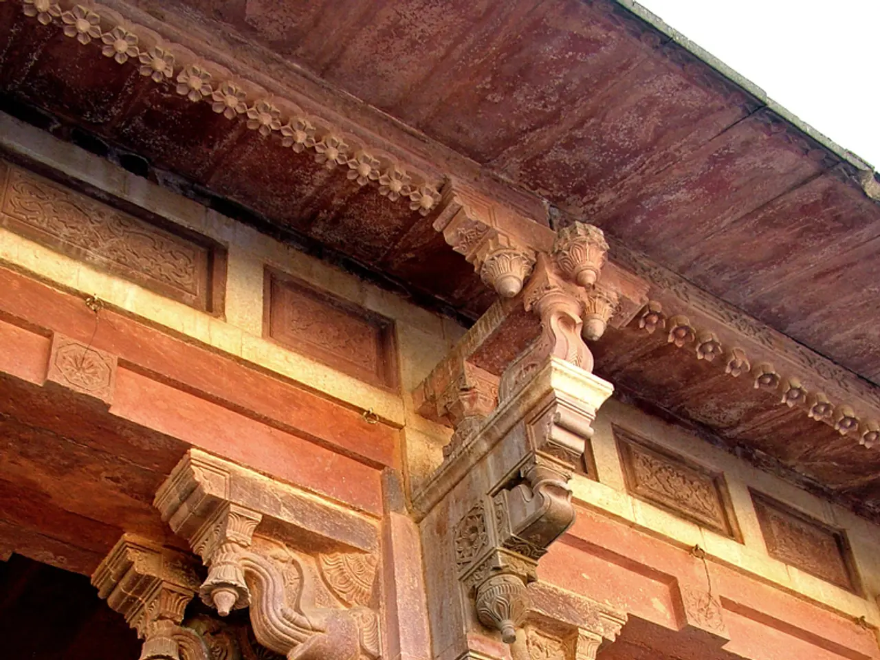 In this image there are pillars of the temple.