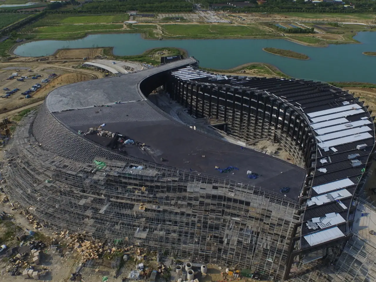 This is a building, this is water and grass, this is car.
