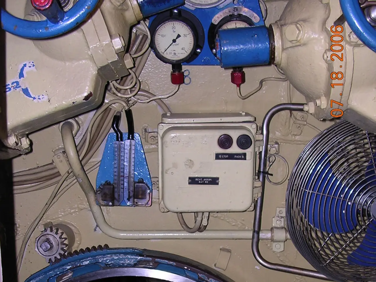 In this image we can see a boy sitting in the vehicle.