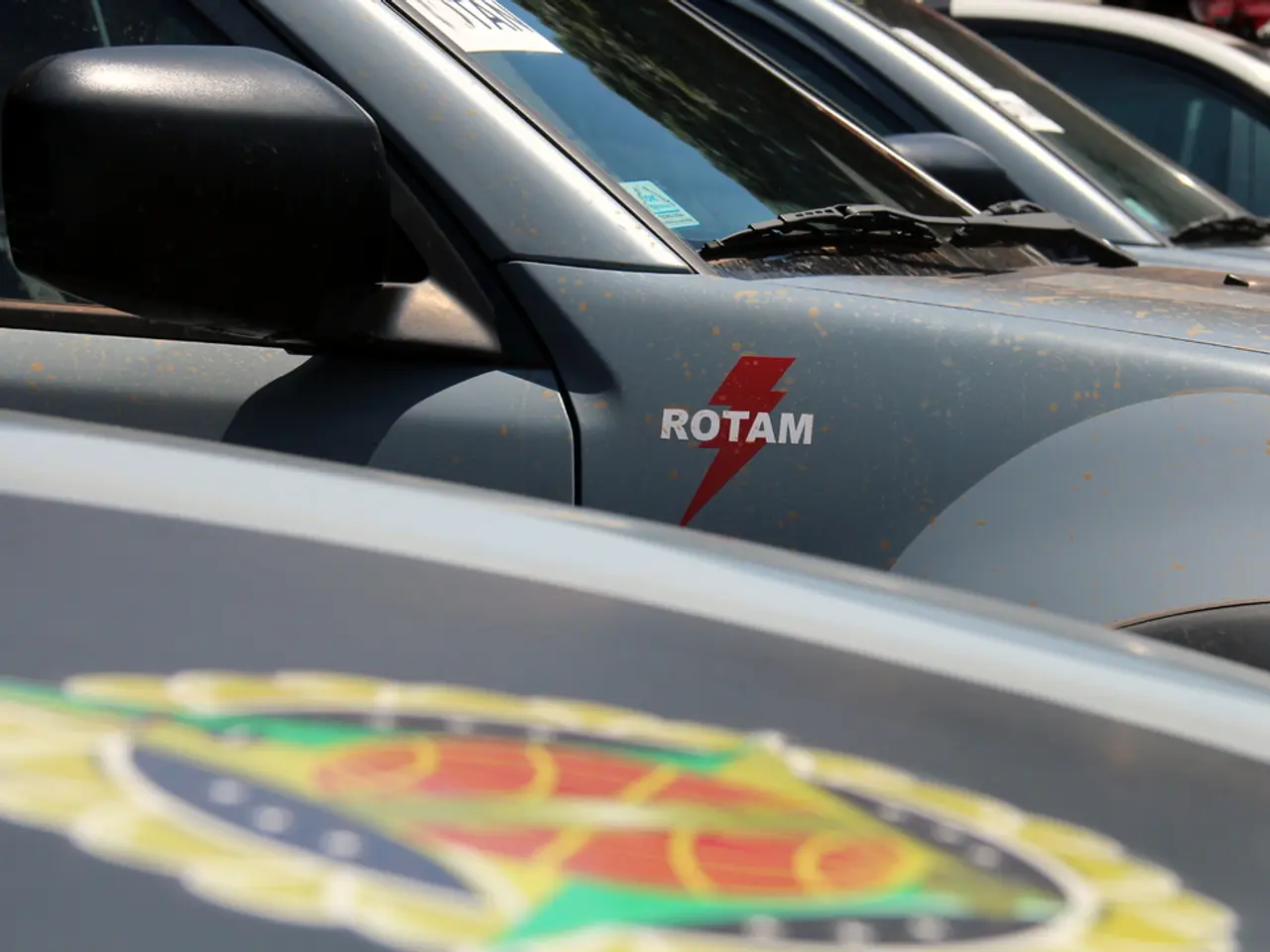 In the image we can see some vehicles.