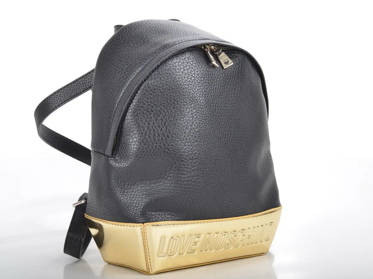 This black and gold color bag is highlighted in this picture.