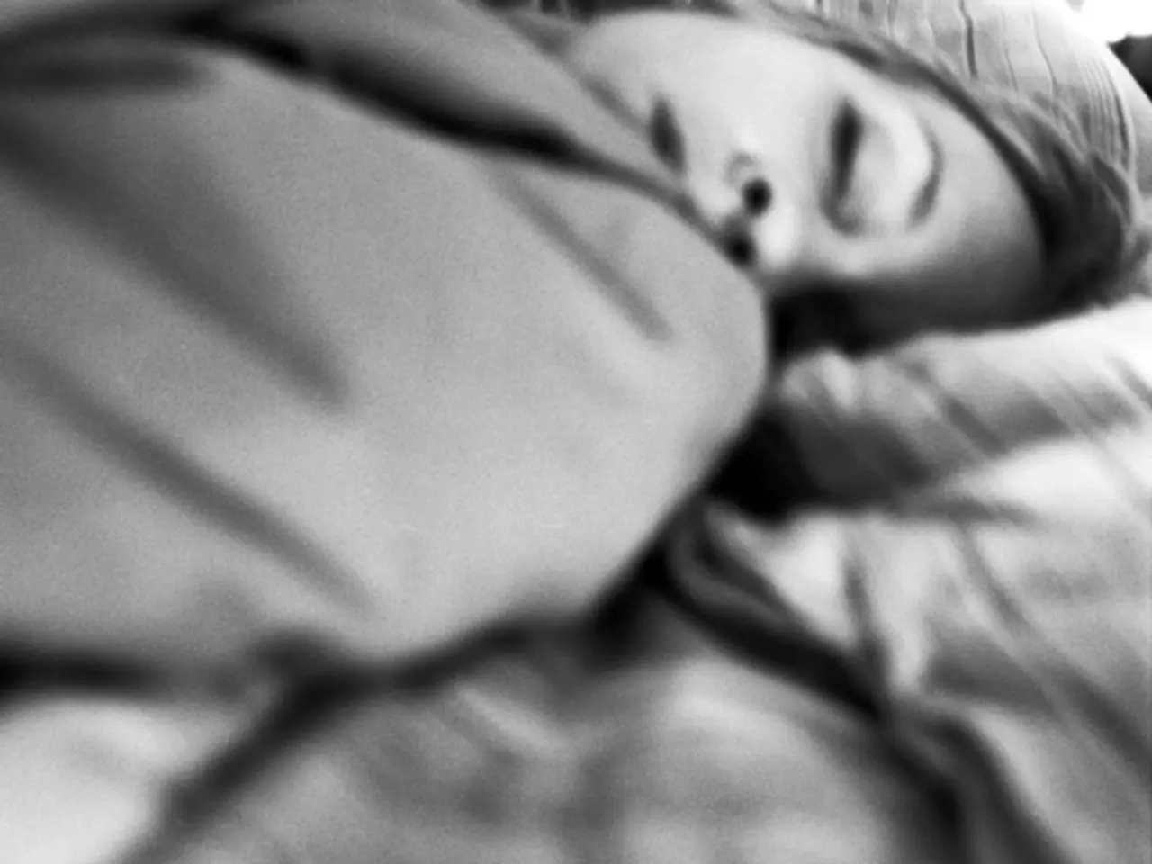 This image is a black and white image. This image is taken indoors. At the bottom of the match...