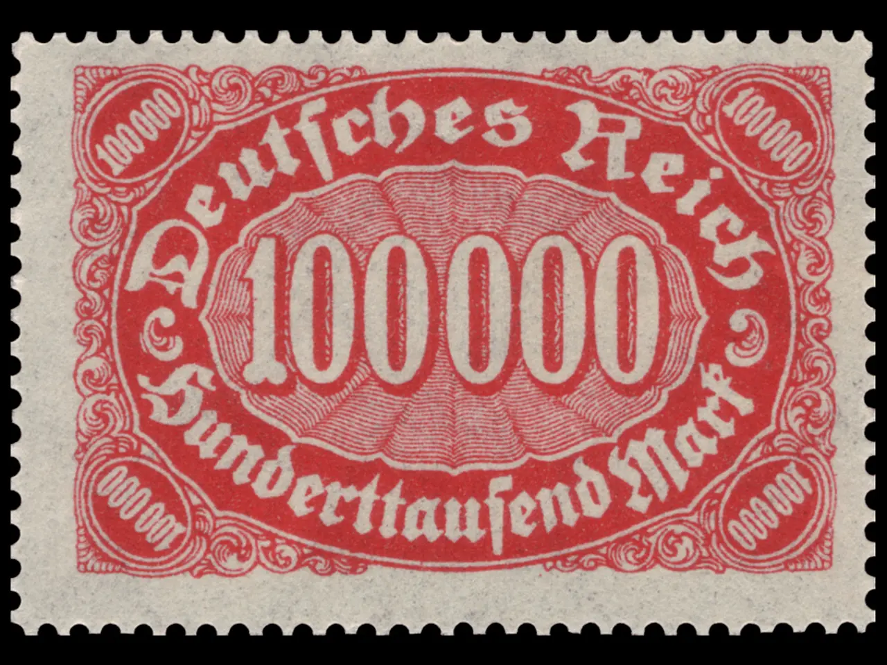 The image shows a red stamp with the words "Deutsches Reich" written on it against a black...