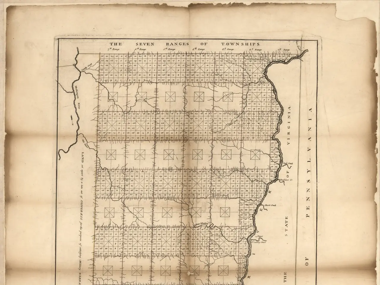 The image shows an old map of the state of Illinois on a piece of paper with text written on it....