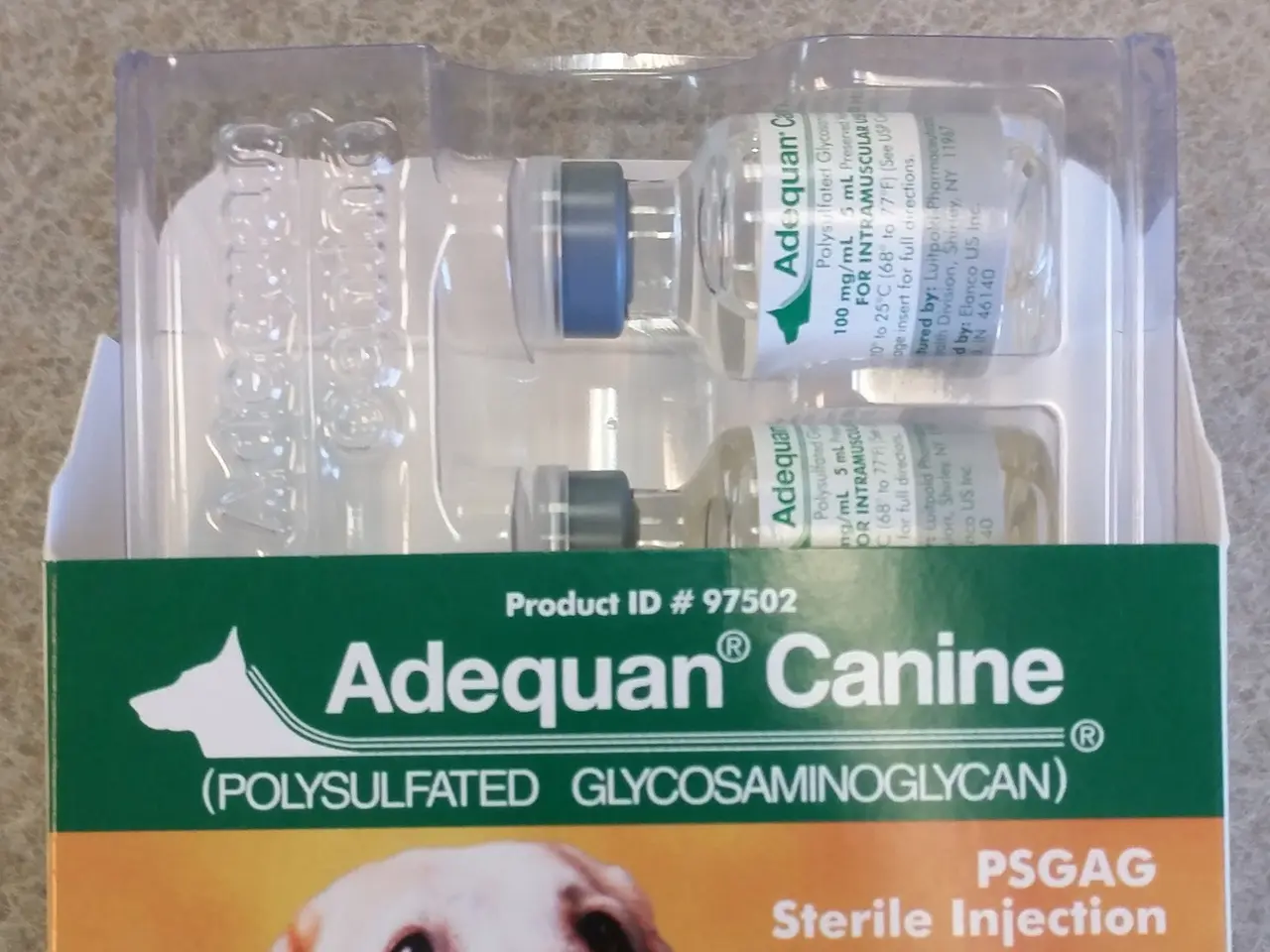 The image shows a box of Adequan Canine Polysulfated Glycosaminoglycan Sterile Injection, with a...