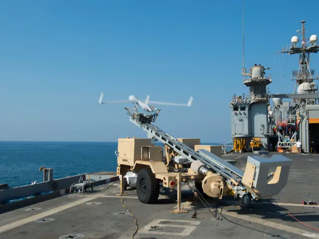 In this picture we can see a battleship in the front, there is a vehicle in the middle, on the left...