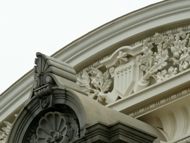 The picture consists of a construction with sculptures on it. At the top it is sky.