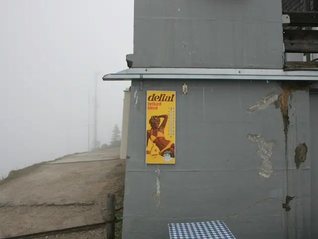 In the foreground of this image, on the right, there is a wall and a poster on it. On the bottom,...