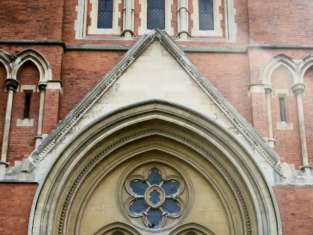It is a famous church in London and there are many windows to the wall and in the entrance there...