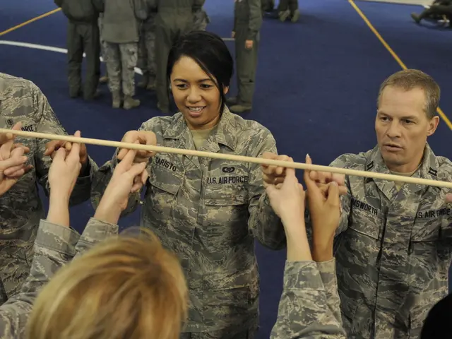 In the picture I can see these people are wearing army uniforms and standing here. Here we can see...