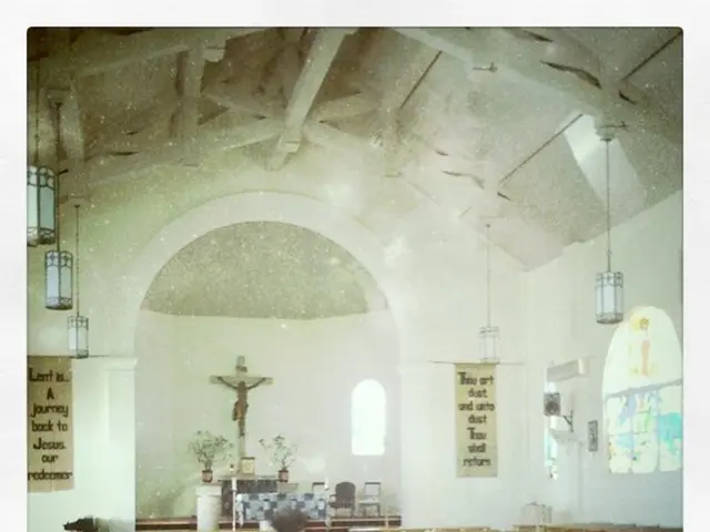 In this image I can see at the bottom there are benches, it looks like an inner part of the church.