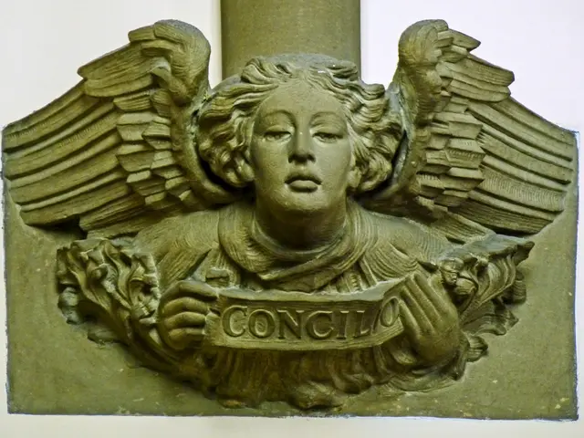 In this image, we can see a stone carving. Here we can see some text.