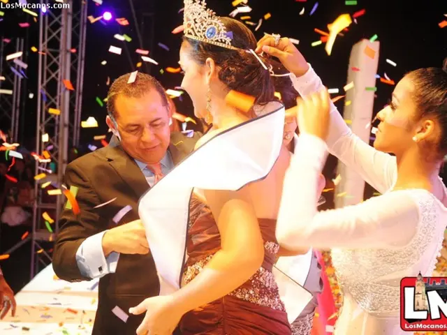 In this picture we can see the girl on the stage in the miss world show and wearing a crown. Behind...