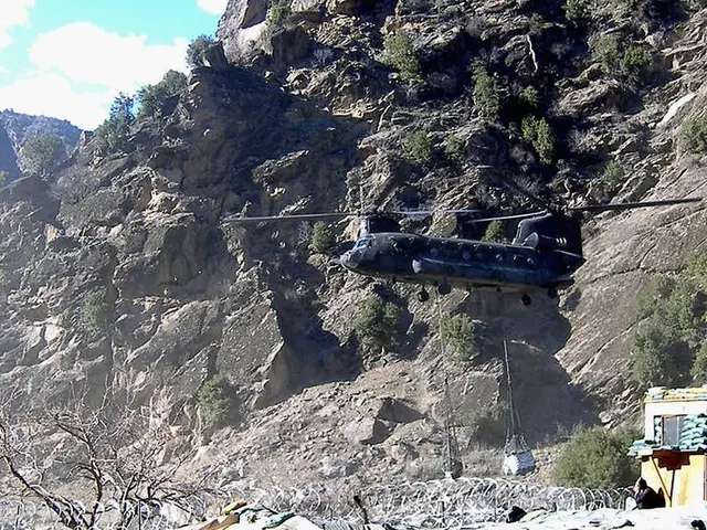 In the image there is a mountain and in front of the mountain there is an aircraft and on the right...