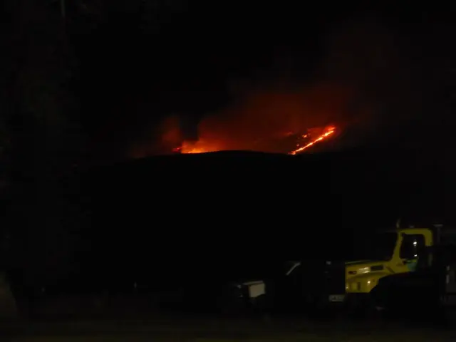 This image is taken during the night time and in this image we can see the vehicle and in the...