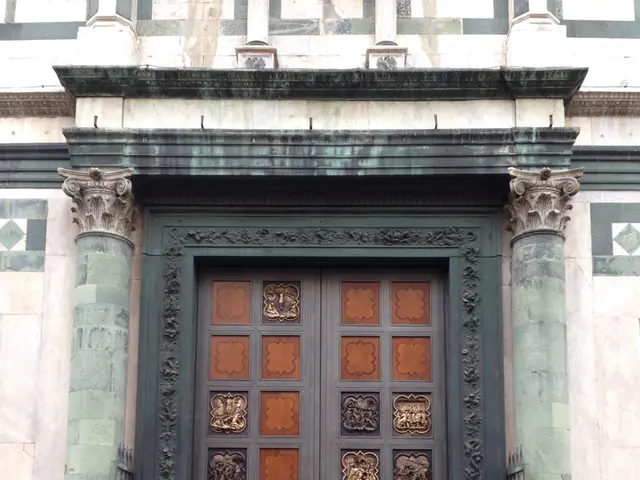 This image contains a door to the wall. Before it there is a pavement. On door there is some...