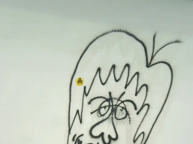 In the center of the image a graffiti is present on the wall. At the bottom of the image floor is...