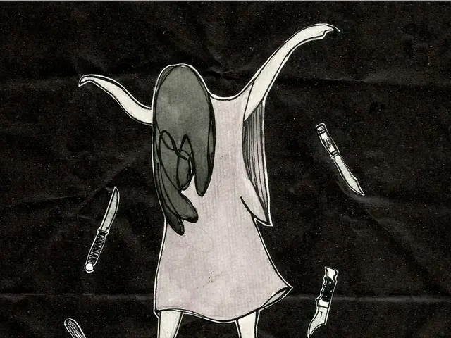 In this picture there is a graffiti in the center of the image.