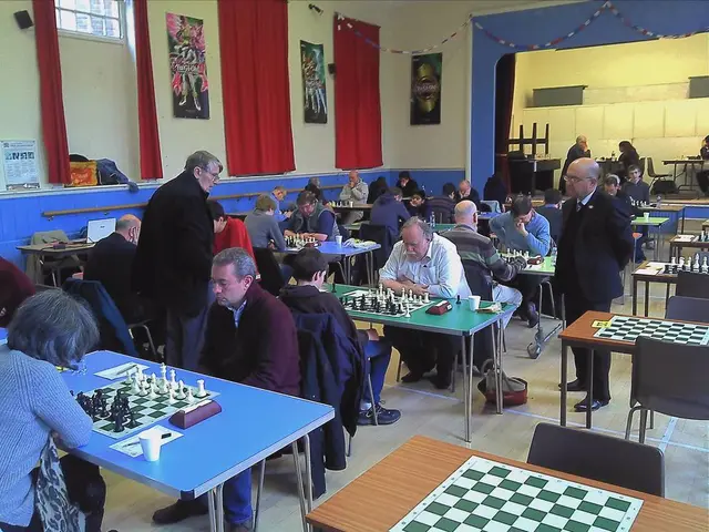 In this image it seems like there is a big hall in which the people are playing the chess. Their is...