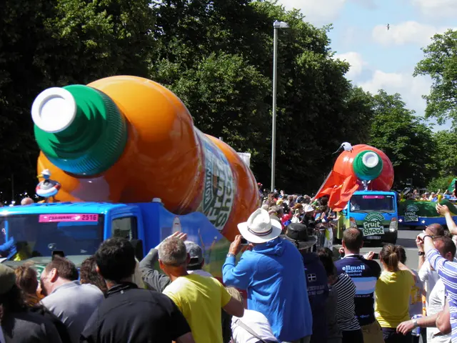 In the image there are trucks with huge bottle shaped tanks above it and many people standing on...