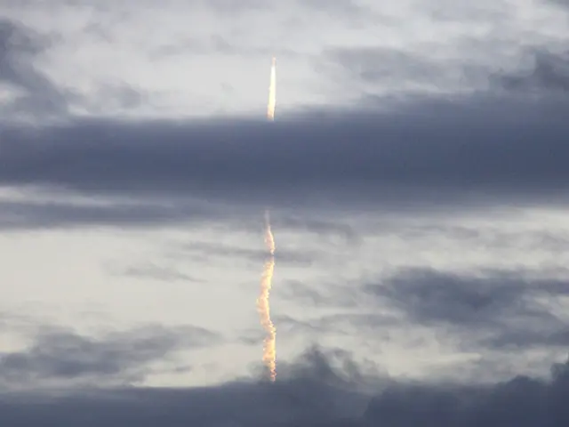 In the center of the picture there is a jet moving and there is smoke below its path. Sky is...