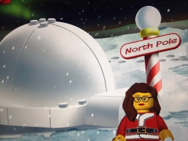 This is an animation and here we can see images of an igloo, a pole and a toy and we can see snow...