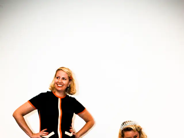 This woman wore black dress and giving still. This woman is sitting on a bench and looking at this...