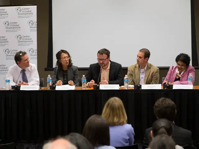 This image is clicked in a meeting room where there is a table and table consists of name boards...