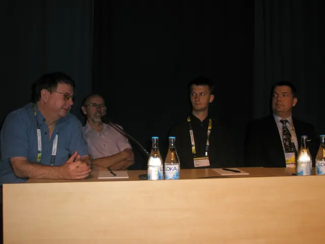 In this image we can see a four people sitting on a chair and the person on the left side is...