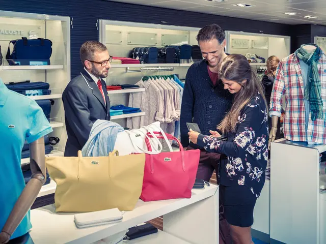 In the middle of the image, there are three persons standing and looking at the purse and having a...