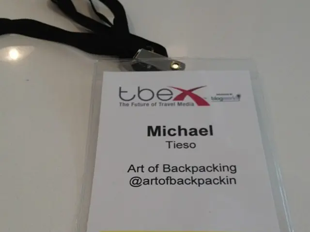 There is an identity card of some person working as a travel blogger.