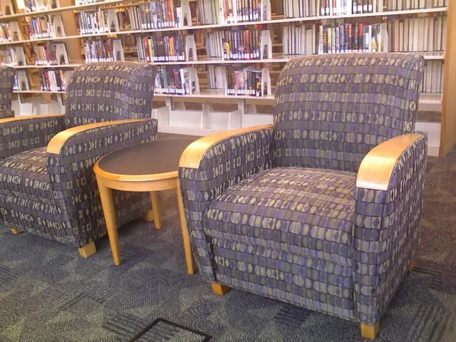 There are three sofas present in the closed room and between them there is one table and behind the...