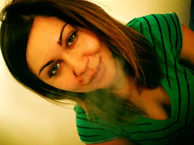 In this picture there is a lady in the center of the image.