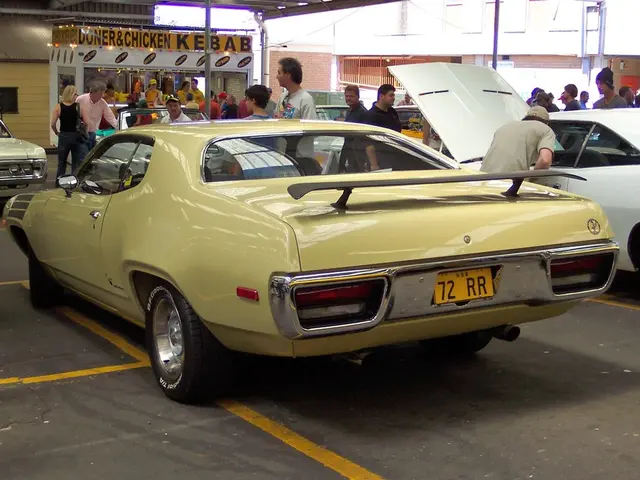 Here in this picture we can see vintage cars present on the road over there and we can see people...