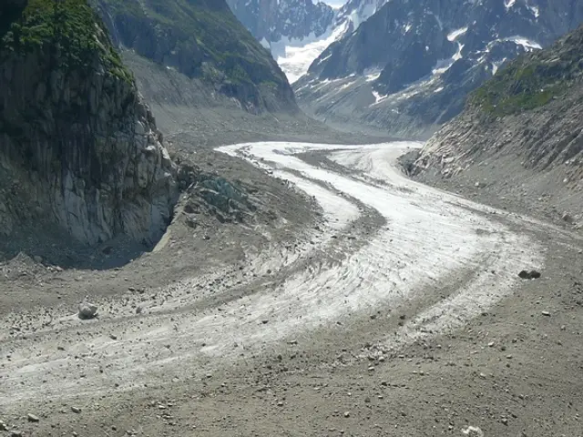 There are people climbing on the ladders in the foreground area of the image, there are stones,...