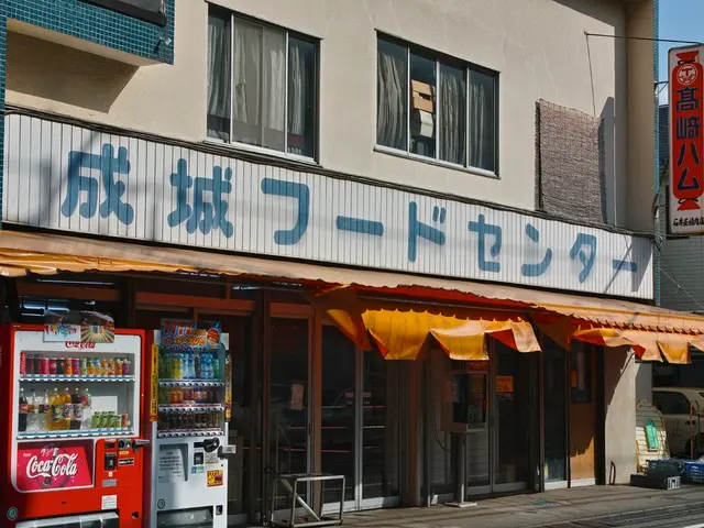 In this image I can see few colorful bottles inside the machines. To the right I can see few...