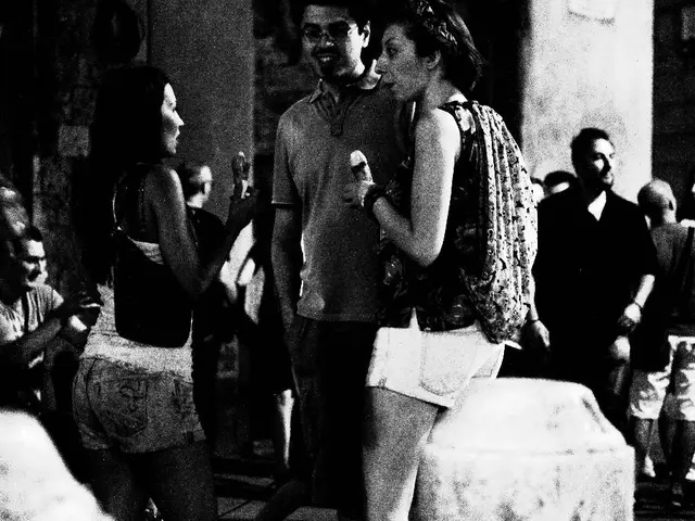 In this picture there are people on the right and left side of the image, it seems to be the road...